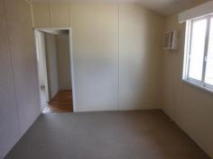  24 Monash St Clermont QLD 4721 $204,000 POSITION and PLENTY OF SPACE!! This large 4 bedroom home located on a 1012m² block is one not to be missed and will not last long at this price! Entrance area is a massive sunroom allowing plenty of natural light and continual breeze; over-sized light-filled dining room; lounge room with high ceilings and stained glass windows; renovated kitchen with plenty of cupboard space, pantry and dishwasher; 4 spacious carpeted bedrooms; large bathroom complete with vanity, shower and bath-tub; lots of storage room under the house which is completely concreted; PLUS ceiling fans and air-conditioning throughout, new neutral coloured paint and flooring, fully fenced yard, and extra large backyard big enough to build a shed or a pool - or even both! What an ideal buy for a family, a first home-buyer or an investor alike.   Property Snapshot  Property Type: House Construction: Weatherboard Land Area: 1,012 m2 Features: Close to schools Dining Room Dishwasher Fully Fenced Yard Lounge Sunroom 