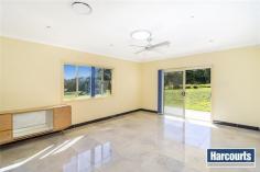  37 Kamrock Grove Wilberforce NSW 2756 Property Information Open Home Dates: Saturday 13 Jun 3:00 PM - 3:30 PM This near new single level architect designed family home is set on a serene ten acre property at the end of private road in a quiet bushland setting, the perfect home for those looking for a bit of an escape from the normal residential suburbs. Enjoying 180 degree bush views there's enough room in this purpose built home for two families to leave comfortably. This modern light filled spacious home will have you waking up to the sounds of the birds and the feeling of relaxation on a daily basis however still being conveniently located 5 minutes from Wilberforce town centre. The home includes: - 7 bedrooms all with built ins or 6 bedrooms with a home office option. Master bedroom featuring ensuite and walk in robe - Possibility to create a separate living area with it's own bathroom, kitchenette and living area for guests, in law accommodation or teenage retreat - Space for everyone with a family room, lounge dining and rumpus area all with easy to maintain stone look tiled flooring - Plenty of bathrooms for the family along with a guest bathroom off the rumpus area - Modern kitchen to placate the chef of the family with beautiful stone benches large enough for a eat in area, stainless steel appliances, plenty of storage space and a pantry - Large water tank  - Four car garage with internal access and it's own bathroom & kitchenette for the home handyman or car enthusiast  - Undercover entertaining area - the perfect position to watch the sun rise over the bush backdrop You really must see this home if you want space for the family and endless possibility on the flat 10.5 acre block Property Type 	 Acreage/semi rural, House 