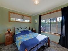  595 Native Corners Rd Campania TAS 7026 $365,000+ Charming Country Living With winter on the way, are you looking for a cosy country home where you can snuggle in front of the fire? You'll love coming home to your own sweet rural retreat. Only 35 minutes from Hobart and set on about 5 1/2 acres of low maintenance cleared land, this lovingly maintained home is perfect for the homebuyer who longs to get away from it all without breaking the budget. This home has a welcoming feel to it that makes you want to linger. Upon entering, you'll notice the wood heater in the lounge has been placed against an inside wall, ensuring it heats the whole house. Attractive windowed doors with decorative glass can be closed to separate the two living areas. The main lounge window looks out onto the nearby hills and valleys that are so flawless it is like having a beautiful painting on your wall. The kitchen inspires visions of home cooked meals, mouth-watering casseroles and roasts. There is lots of pantry space and a kitchen island for extra bench space. A bay window in the generous dining area adds charm and gives a resplendent view of the hills and yard, complete with adorable gazebo, swaddled in fragrant geranium.  Toward the back of the house is the bathroom and with its deep tub and decorative glass window you are sure to be enticed into many a relaxing bubble bath. The laundry is practical and functional with good cupboard space. Surprisingly spacious yet still having an intimate feel, this home has been cleverly designed to have separation between the master bedroom and the other sleeping quarters, ideal for families who appreciate their own space and privacy. Two cosy bedrooms are at one end of the hall and get good sun. Both have built in robes. The inviting master bedroom at the far end of the hall is much larger and has a sizeable built in robe plus views from the generously size window. You can lie in bed and take in the scenery upon waking. The property also has a large colourbond workshop/garage, raised garden beds out the back for growing your own vegies, a garden shed plus three huge water tanks. Further up the hill is a barn/woodshed. To complete this idyllic country home, a covered Verandah runs all the way around the house, with a deck placed off the second living area. This area is perfect for outdoor entertaining with friends on warm summer evenings or a place to cosy up with a loved one, share a bottle of wine and marvel at the stars. Underneath the deck is a storage area.  By the way, this house with its sunny aspect and inviting feel will draw all your friends in and it is likely you will have friends and family dropping by all the time.  It's just that kind of place. Call Aaron or Helen now to secure your private inspection time.   Property Snapshot  Property Type: House Aspect Views: Mountain Construction: Brick House Size: 147.00 m2 Land Area: 5.50 acres Features: Built-In-Robes Decking Gazebo Heatpump Rumpus Room 