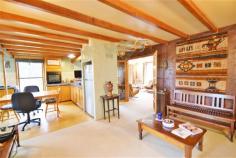  13369 Highland Lakes Rd Golden Valley TAS 7304 $335,000 - $355,000 Property Information A true wish list property for the discerning rural lifestyle property buyer. Just a mere 10 minutes drive from the vibrant township of Deloraine in Tasmania's northern heart, and located in one our most sought after locations in Golden valley. This impressive double storey, rendered brick home set well back from the road in a superbly private setting, with the awesome "Quamby Bluff" displaying a magnificent backdrop behind you, is just divine.  Offering some 26 building squares of comfortable living on two levels, this home is a lifestyle retreat with no equal in its "For Sale" price bracket, and has a charm and ambience hard to find in any range or offering in the magical Meander valley. On offer is ground level living comprising 3 generous bedrooms with built in robes, full bathroom with room to move, open plan kitchen, dining and informal living combination, study nook, big laundry with exterior access, large formal lounge room with classy open fire that opens onto a generous undercover deck, perfectly positioned to soak up that winter sunshine. A large electric space heater in the occasional living room and "in floor heating", keep the home toasty and warm. Complimenting the Spanish / Mediterranean feel of the home is a lovely tiled veranda / front entry area that sings out "welcome" to all your guests. The upper level is a true parent's retreat, with a huge master bedroom and ensuite combination, private, warm, and with an air of relaxed living creating a perfect atmosphere. Also on this level is a huge rumpus / games room, or what ever you may desire, spread yourself out and enjoy the space. The private, north facing setting is a standout. Rich soils and fertile valley flats that should produce an abundance of produce from your 3.28 hectares, (8.1 acres) of land. Water is well catered for with a large underground tank, sizable property storage dam, and a small creek that touches on the eastern boundary of the holding for a short distance. An enclosed car shed takes care of your domestic transport, and a couple of garden sheds keep your maintenance tools tidy, and the landscaping and fencing are all in good order. Been searching for that Tasmanian lifestyle escape property? Please add this property at 13369 Highland Lakes road to your short list, you will be glad you did. Floor Area 	 26 squares Land Size 	 3.28 Ha Tenure 	 Freehold Property condition 	 Excellent Property Type 	 Land, Acreage/semi rural, House Garaging / carparking 	 Enclosed carport Construction 	 Render and Brick veneer Joinery 	 Aluminium Roof 	 Tile and Concrete Insulation 	 Ceiling Walls / Interior 	 Brick, Gyprock Flooring 	 Tiles and Carpet Window coverings 	 Drapes, Curtains Heating / Cooling 	 Woodfire (Open), Electric, Other (Under floor) Chattels remaining 	 Blinds, Drapes, Fixed floor coverings, Light fittings, Stove, TV aerial, Curtains Kitchen 	 Standard, Separate, Upright stove, Breakfast bar and Finished in Timber and Laminate Living area 	 Formal lounge Main bedroom 	 King and Built-in-robe Ensuite 	 Separate shower Bedroom 2 	 Double and Built-in / wardrobe Bedroom 3 	 Double and Built-in / wardrobe Bedroom 4 	 Double and Built-in / wardrobe Additional rooms 	 Rumpus Main bathroom 	 Bath, Separate shower, Heater, Additional bathrooms Laundry 	 Separate Views 	 Rural Aspect 	 North Outdoor living 	 Garden, Deck / patio, Verandah Fencing 	 Fully fenced Land contour 	 Flat to sloping Grounds 	 Manicured, Backyard access Garden 	 Garden shed Water heating 	 Electric Water supply 	 Tank (size: Tank Dam and Creek) Sewerage 	 Septic 