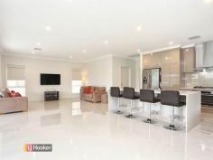  77 The Blvd Parafield Gardens SA 5107 $485,000 - $495,000 OPEN: Saturday 13th June 1245-115 Pm. SPECTACULAR LUXURY LIVING A sensational feeling is upon you when entering this meticulously built modern home, This one year young 'Distinctive Homes' built property proudly located within 'The Boulevard' provision of Parafield Gardens is designed to accommodate an ever growing family. Highlight features on offer include a sizable master bedroom featuring a walk through his and her robe and vast ensuite featuring a dual double length shower, double vanity and floor to ceiling quality tiling. Bedrooms two and three are both of size and includes floor to ceiling mirrored built in robes, whilst bedroom four and the additional study would make fantastic use as a home office and/or teenager living room. Servicing the remaining bedrooms is the properties second bathroom, featuring a full length shower and handy separate water closet. An amazing kitchen is also what makes this property even more special! Highlight kitchen features are;  - Vast 'Caesar Stone' bench tops and ample overhead cupboard space - Top of the range stainless steel 'Westinghouse' appliances including dishwasher, one 900 ml oven and gas cooktop and another 600 ml wall mounted oven and a fully ducted range hood - Incredible integrated walk in pantry with floor to ceiling storage options - A breakfast bar - A double fridge space with plumbed in water for fridge - Soft closing drawers, amongst other features. Adjacent to the kitchen is the large open plan living and dining room. Through the retractable sliding doors outside and you will be greeted with the alfresco entertaining area, complete with surrounding pull down screens, a gas outlet and water plumbing for possible installation of a kitchen and wall mounted TV. The pretty green lawn area would make the perfect space for the kids and/or family pet to have a run around!  Further notable features include a double automatic panel lift garage with external rear access, 60 by 60 Porcelain tiles in all main living and entry areas, a monitored alarm system, a 12.5 kw reverse cycle ducted air conditioning with zone control, hallway storage and a large functional laundry. Please Contact Agent For Further Details. RLA 235 270.   Property Snapshot  Property Type: House 