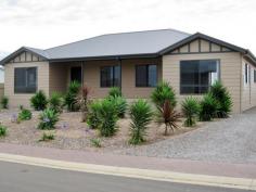  3 Dart Close Edithburgh SA 5583 $338,000 Vendor Meets Market - Price Reduction Quality property situated along the scenic coastline of Yorke Peninsula. Light and bright throughout your spacious open plan Kitchen/Dining/Lounge with adjoining Family room (s/system a/con), 3 double Bedrooms, & Master with Ensuite/WIR. Plus additional 3-way- Bathroom with separate Toilet & Laundry.  You will also find a modest rear entertaining deck to cater for any events, modern (20' x 30') Double Garage including power/lighting/flooring, sufficient rainwater storage (22,500L) with pump & low maintenance garden.  A great family home or coastal getaway, offering investment opportunities. Inspection by appointment.   Property Snapshot  Property Type: House Construction: Cladding Land Area: 700 m2 Features: Coastal Decking Ensuite Established Gardens Fenced Back Yard Gas Storage Verandah 
