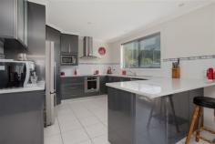  4 Greens Beach Rd Beaconsfield TAS 7270 $249,000 - $259,000 Property Information Looks small from the Street, how wrong you are.... Upon entering the home it just keeps going! Featuring 3 double bedrooms, all with built in robes, main with a sumptuous ensuite. Open plan lounge, dining and state of the art kitchen with stainless steel European appliances. The second bathroom with concealed laundry, stacks of storage throughout with quality fixtures and fittings including feature tiling, stain master carpets, venetian blinds just to name a few. Fully insulated walls and ceiling, reverse cycle heat pump, under cover entertaining area, double carport, a super low maintenance home and garden. The home has the added bonus of solar power and hot water. Perfect 1st home, investment or down sizer. Move in and enjoy nothing to do! Floor Area 	 123 sqm Land Size 	 551 sqm Approx year built 	 2010 Property condition 	 New Property Type 	 House House style 	 Contemporary Garaging / carparking 	 Open carport Construction 	 Colorbond Joinery 	 Aluminium Insulation 	 Walls, Ceiling Walls / Interior 	 Gyprock Flooring 	 Tiles and Carpet Window coverings 	 Blinds (Venetian) Heating / Cooling 	 Reverse cycle a/c Electrical 	 TV points, TV aerial, Phone extensions Property features 	 Smoke alarms Chattels remaining 	 Fixed floor coverings, light fittings, window furnishings, Viva oven, Schott ceramic hot plates, Robin hood rangehood, Indesit dishwasher, Tiffany microwave, Fisher & paykel fridge, Blinds, Fixed floor coverings, Light fittings, TV aerial Kitchen 	 Modern, Open plan, Dishwasher, Separate cooktop, Separate oven, Rangehood, Extractor fan, Double sink, Breakfast bar, Microwave, Pantry and Finished in Other (Laminex) Living area 	 Open plan Main bedroom 	 Double and Built-in-robe Ensuite 	 Separate shower, Spa bath Bedroom 2 	 Double and Built-in / wardrobe Bedroom 3 	 Double and Built-in / wardrobe Main bathroom 	 Separate shower Laundry 	 In bathroom Views 	 Private Aspect 	 North Outdoor living 	 Entertainment area (Covered and Concrete), BBQ area (with lighting and with power) Fencing 	 Fully fenced, Materials (Colorbond) Land contour 	 Flat Grounds 	 Landscaped / designer, Manicured Garden 	 Garden shed (Sizes: 3m x 3m, Number of sheds: 1) Water heating 	 Solar, Electric Water supply 	 Town supply Sewerage 	 Mains Locality 	 Close to transport, Close to schools, Close to shops Fixtures/chattels excluded 	 1 x 2 spot tastic, 1 x 4 spot tastic, Solar hot water, solar power 10 panels 