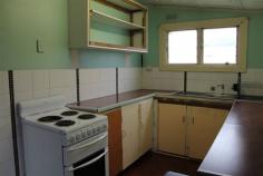  60-62 Esplanade Queenstown TAS 7467 $35,000 Property Information Cottage on two blocks. Just what the renovator is looking for. Some of the hard work is done. Lounge has pure heat wall heater for warmth while renovating. Kitchen complete with stove. Bathroom has been renovated with tiled floor, new shower, vanity and ceiling heating. New toilet. Some of the new cladding has been done but plenty of scope to add your own touch. Great workshop with character which will come in handy for storing tools for the renovation. Spare block of 376sqm for gardens or chooks. With some hard work you could own your very own. Call to discuss further or to organise inspection. Land Size 	 610 sqm Property condition 	 Renovator Property Type 	 House House style 	 Cottage Garaging / carparking 	 Off street Construction 	 Timber and Cladding Joinery 	 Timber Roof 	 Iron Walls / Interior 	 Panel sheeting Flooring 	 Carpet, Other (Vinyl) and Timber Window coverings 	 Drapes Heating / Cooling 	 Electric Chattels remaining 	 Fixed floor coverings, Light fittings, Stove, Curtains Kitchen 	 Original and Upright stove Living area 	 Separate living, Separate dining Main bedroom 	 Double Bedroom 2 	 Double Main bathroom 	 Separate shower, Heater Laundry 	 Separate Workshop 	 Separate Views 	 Urban Fencing 	 Partial Land contour 	 Flat Grounds 	 Overgrown Water heating 	 Electric Water supply 	 Town supply Sewerage 	 Mains Locality 	 Close to shops, Close to schools 