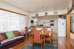  41/43 Crowther St Beaconsfield TAS 7270 $229,000 - $249,000 Property Information Originally built in 1966 as a Rectory this large home has been modernised throughout, boasting additions such as solar panels (a 3kw system), new guttering, new security window screens, relatively new kitchen, new dishwasher, new carpet in the living area etc. that now represents a great opportunity for families, entertainers, hobbyists etc. to secure a larger than average home complimented by generous fully fenced grounds, a double garage, a double carport (tall enough to house the average size boat), an undercover entertaining area and 3 garden sheds providing more than adequate outdoor storage. Meticulously maintained, the home is composed of generously proportioned rooms allowing for flexibility of use for bedrooms and living zones, combined with a real bonus being the 5th bedroom, kitchenette and second toilet set apart from the main house (subject to council approval this area could be converted to separate living quarters with very little work or simply use as is for guest accommodation, extended family, teenagers retreat, hobby space or the perfect office, particularly for those that work from home needing their own quiet space away from the residence).  The main residence complete with ducted wood heating comprises a spacious entrance hall, 4 double/queen size bedrooms all with built in robes, bathroom including a bath and separate shower, modern kitchen incorporating ample bench and cupboard space, breakfast bar, dishwasher and a pantry, dining with lovely polished boards (overlooking the garden), light airy lounge, large laundry with built-in storage and finally via the undercover entertaining area to the separate kitchenette, 2nd toilet and king size 5th bedroom with built in shelving. A leisurely stroll through the 1618sqm corner allotment, reveals lovely established trees combined with a vast array of plantings for colour, plenty of space for the children to run and play with endless nooks and crannies for them to explore, safely fenced for pets, veggie garden with room for the keen gardener to expand if desired, multiple fruit trees, three storage sheds and a chicken run. Conveniently located within walking distance of local shopping, primary school, doctor, vet, chemist etc., approximately 30 minutes from Launceston and even closer to George Town, this property will hold appeal for commuters and locals alike. A drive by will not suffice, inspection is a must to fully appreciate all this affordable property has to offer. Call Kaylene Bushby now to arrange your viewing of a property that you will be proud to call home ! Floor Area 	 148 sqm Land Size 	 1618 sqm Tenure 	 Freehold Approx year built 	 1966 Property condition 	 Good Property Type 	 House Garaging / carparking 	 Double lock-up, Open carport, Off street, Free standing Construction 	 Brick veneer Joinery 	 Aluminium Roof 	 Roof Decking Flooring 	 Carpet, Polished and Other (Lino) Window coverings 	 Drapes, Curtains Heating / Cooling 	 Woodfire (Closed) Chattels remaining 	 All Fixed Floor Coverings, All WIndow Furnishings, All Light Fittings, Insect Screens; Three Security (Screen) Doors, WIndow Security Screens, Three Garden Sheds, One Electrolux Chef Wall Oven, Hot Plates, One Range Hood, One Dishwasher, One Saxon In-Built Wood Heater and One Clothes Line. Kitchen 	 Modern, Dishwasher, Separate cooktop, Separate oven, Rangehood, Breakfast bar and Pantry Living area 	 Separate living, Separate dining Main bedroom 	 Double and Built-in-robe Bedroom 2 	 Double and Built-in / wardrobe Bedroom 3 	 Double and Built-in / wardrobe Bedroom 4 	 Double and Built-in / wardrobe Extra bedrooms 	 Double plus robe Main bathroom 	 Bath, Separate shower Entrance 	 Large Entrance Hall Laundry 	 Separate Views 	 Urban, Rural Outdoor living 	 Entertainment area (Covered), Garden Fencing 	 Fully fenced Land contour 	 Flat to sloping Grounds 	 Tidy, Backyard access Garden 	 Garden shed (Number of sheds: 3) Water heating 	 Electric Water supply 	 Town supply Sewerage 	 Mains Locality 	 Close to shops, Close to schools 