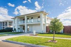  73-75 Westlakes Boulevard Lara VIC 3212 $729,000 - $759,000 Your Grand lifestyle awaits you 4 3 2 Three words come to mind when viewing this 4 Bedroom home," Impressive, Impeccable and Stylish" yet it is a carefully thought out residence that combines the impressive with practical functionality. The design flows effortlessly both inside and out with zoned heating and cooling allowing for comfort throughout the seasons. Taking pride of place on the lake front in the established Grandlakes estate, the property boasts excellent side access for those extra cars, boats and toys and an abundance of extra features from the several living zones facing out to the views to the spectacular kitchen which is a masterpiece in itself with its flowing stone bench tops, large island bench, s/s appliances and an exquisite butler’s pantry. There are two master bedrooms with one being downstairs with its own ensuite and WIR whilst upstairs there are a further 3 BRs all large with the master suite including the fitted out generous WIR, ensuite and parents retreat. There is a large rumpus/ games room with fantastic views to the lake and parklands which has access to the fabulous tiled entertainment sized balcony perfect for those balmy evenings. Other striking features of the home include fresh neutral tones, alarm system, quality window and floor coverings, a multitude of storage cupboards, landscaped gardens and more. This is a home one must see to appreciate so call today to book your inspection. 