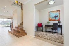  73-75 Westlakes Boulevard Lara VIC 3212 $729,000 - $759,000 Your Grand lifestyle awaits you 4 3 2 Three words come to mind when viewing this 4 Bedroom home," Impressive, Impeccable and Stylish" yet it is a carefully thought out residence that combines the impressive with practical functionality. The design flows effortlessly both inside and out with zoned heating and cooling allowing for comfort throughout the seasons. Taking pride of place on the lake front in the established Grandlakes estate, the property boasts excellent side access for those extra cars, boats and toys and an abundance of extra features from the several living zones facing out to the views to the spectacular kitchen which is a masterpiece in itself with its flowing stone bench tops, large island bench, s/s appliances and an exquisite butler’s pantry. There are two master bedrooms with one being downstairs with its own ensuite and WIR whilst upstairs there are a further 3 BRs all large with the master suite including the fitted out generous WIR, ensuite and parents retreat. There is a large rumpus/ games room with fantastic views to the lake and parklands which has access to the fabulous tiled entertainment sized balcony perfect for those balmy evenings. Other striking features of the home include fresh neutral tones, alarm system, quality window and floor coverings, a multitude of storage cupboards, landscaped gardens and more. This is a home one must see to appreciate so call today to book your inspection. 