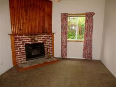  92-94 Batchelor Street Queenstown TAS 7467 $99,000 Property Information Owner is willing to lease back at an 8.4% rental yield. Perfect tenants to look after your investment.Three Bedroom and study and two living areas. Large lounge opening up to front balcony. Open plan kitchen, dining and lounge with electric heating. Kitchen has lots of cupboard space and dishwasher. Separate sitting room with wood fired heating. Master bedroom with walk in robe. Bathroom with shower. Garage has plenty of workshop and storage space. Carport and fully fenced. Call to discuss further or to organise your inspection. Floor Area 	 118.4 sqm Land Size 	 1385 sqm Property condition 	 Good Property Type 	 House House style 	 Bungalow Garaging / carparking 	 Single lock-up, Open carport, Off street Walls / Interior 	 Panel sheeting Flooring 	 Other (Vinyl) and Carpet Window coverings 	 Drapes Heating / Cooling 	 Woodfire (Closed), Electric Chattels remaining 	 Wood Fire, Blinds, Drapes, Fixed floor coverings, Light fittings, Stove, TV aerial, Curtains Kitchen 	 Modern, Open plan, Dishwasher and Rangehood Living area 	 Open plan Main bedroom 	 King and Walk-in-robe Bedroom 2 	 Double Bedroom 3 	 Single Main bathroom 	 Separate shower Laundry 	 Separate Workshop 	 Combined Views 	 Urban Outdoor living 	 Deck / patio Fencing 	 Fully fenced Land contour 	 Flat to sloping Grounds 	 Tidy Water heating 	 Electric Water supply 	 Town supply Sewerage 	 Mains Locality 	 Close to schools, Close to shops 