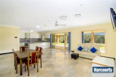  37 Kamrock Grove Wilberforce NSW 2756 Property Information Open Home Dates: Saturday 13 Jun 3:00 PM - 3:30 PM This near new single level architect designed family home is set on a serene ten acre property at the end of private road in a quiet bushland setting, the perfect home for those looking for a bit of an escape from the normal residential suburbs. Enjoying 180 degree bush views there's enough room in this purpose built home for two families to leave comfortably. This modern light filled spacious home will have you waking up to the sounds of the birds and the feeling of relaxation on a daily basis however still being conveniently located 5 minutes from Wilberforce town centre. The home includes: - 7 bedrooms all with built ins or 6 bedrooms with a home office option. Master bedroom featuring ensuite and walk in robe - Possibility to create a separate living area with it's own bathroom, kitchenette and living area for guests, in law accommodation or teenage retreat - Space for everyone with a family room, lounge dining and rumpus area all with easy to maintain stone look tiled flooring - Plenty of bathrooms for the family along with a guest bathroom off the rumpus area - Modern kitchen to placate the chef of the family with beautiful stone benches large enough for a eat in area, stainless steel appliances, plenty of storage space and a pantry - Large water tank  - Four car garage with internal access and it's own bathroom & kitchenette for the home handyman or car enthusiast  - Undercover entertaining area - the perfect position to watch the sun rise over the bush backdrop You really must see this home if you want space for the family and endless possibility on the flat 10.5 acre block Property Type 	 Acreage/semi rural, House 