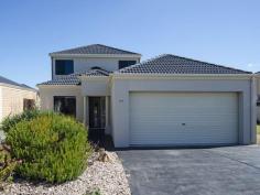  147 Excelsior Parade Hindmarsh Island SA 5214 $515,000 - $525,000 "Magic Marina" Lifestyle Living with an Awesome View! * This well presented 2-storey "Marina Mansion" offers superb/slightly elevated north facing lagoon views + a substantial 4 bedroom home with three bathrooms, two living areas (one up-one down) + a large wet bar/entertaining area up-stairs, x2 covered outdoor areas with multiple sliding doors providing easy access for groups of all ages.  * Feature packed with a well proportioned kitchen includes combination gas/electric stainless appliances, hard wearing floor tiles & loads of cupboards + pantry for all your entertaining needs. Functional modern down lighting & multiple split system R/C air-conditioning keeps the home warm in winter & cool in summer noting the downstairs shower + W/C + laundry add a practicality for the diverse needs of many families. * Other features include up-stairs sleeping accommodation with 2 bedrooms plus supporting bathroom (with bath) plus a massive linen press, two downstairs bedrooms with the master boasting a generous walk-through robe to en-suite ideal for quiet mornings away from everyone and a monitored security system perfect for protecting your asset when away. * Positioned on a very low maintenance approx. 691m2 allotment with a fully paved/fenced side courtyard leading from the rear of the garage opening access down to the water, free standing 2-bay garage with auto lift doors & a substantial jetty mooring perfect for securing all kinds of water craft. Rear lawn plus watering system, retaining walls plus low maintenance garden make the home complete and ready to move into and enjoy. * Inspection at your convenience by calling Peter O'Brien on 0439 807 035 but don't hesitate, at this price this fantastic property won't last long!   Property Snapshot  Property Type: Duplex Aspect Views: Waterfront/ Jetty Construction: Brick Veneer Features: Balcony Rumpus Room Walk-In-Robes 