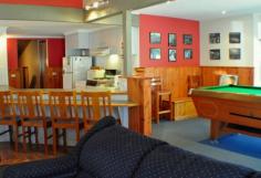  8 Geebung Road Dinner Plain VIC 3898 Owned by the same family for 26 years Crystal Brook Lodge fills you with a warm homely glow from the moment you step inside, a real home away from home.The lodge is configured to easily accommodate several families or small groups, making it ideal for personal or rental use. (currently configured to sleep 16 guests) Featuring the perfect entertaining space, with cosy lounge area, log burning fire and characterful pitched beamed ceilings, open plan kitchen and dining area, and even a pool room to send your prized possessions, or just hang out with family and friends. All this, plus newly refurbished luxury bathrooms, and an enormous spa pool to relax in after a awesome day, with a glass of gluhwein to sooth those aching limbs after a fun day on the slopes. Ground Floor, entertaining areas with pool room, open plan kitchen, two bedrooms one with a double and a set of bunks, the other with 2 sets of bunk beds. Separate toilet, laundry facilities, bathroom with spa pool, separate toilet and drying cupboard. Upstairs, Two bedrooms, one with a double bed and a set of bunks and the other with a double bed and 2 single beds. Hallway features clever storage areas for unpacking bags. Bathroom and toilet. Crystal Brook Lodge is in the rental pool and details in income and outgoings are available upon request.   