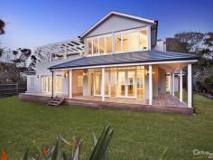 401 Beach Rd Beaumaris VIC 3193 Landmark Estate On High Above Ricketts Point Find World-Class architectural inspiration at Melbourne's pre-eminent clifftop location. Set high above Ricketts Point with a Beach Rd address and a Point Ave location, this breath-taking approx 13444sqft/1249sqm estate showcases Hamptons-inspired design in a unique beachfront location.  Featuring five bedrooms, 3.5 bathrooms, dual studies and multiple living areas, this high-gabled home is oriented for bay-view al fresco living over two levels with French doors to sweeping verandas on the ground-floor and a pergola-shaded glass-edged balcony terrace up above. Designed for an entertaining lifestyle with traditional formal lounge facing the bay, the home steps back to offer family living and dining opening to sandstone-paving through north-facing bi-folds, while an additional rumpus room has its own northerly poolside garden access.  Clever accommodating with suites upstairs and down, the home stars a spectacular first-floor master domain with individually-styled dual dressing-rooms and a vast ensuite, plus a hard-working study on each level.  Appointed to an international standard of design and quality with custom-crafted marble kitchen, the home features individual detailed Travertine-tiled dual vanity bathrooms, solid-hardwood floors and gas and open-fireplaces. With reverse-cycle ducted heating and air-conditioning supplementing hydronic heating, the home is fully alarmed with video-intercom entry and beautiful bespoke cabinetry throughout.  Corner-sited with panoramic bay-views to the front and a direct northerly rear aspect, the home is set vast landscaped grounds with sparkling pool and generous four car auto garage with store and mudroom access to the home. Set on high in a unique bushland setting, this is a landmark beachfront property with international influences and claim to two iconic addresses! PROPERTY DETAILS Contact Agent ID: 301727 
