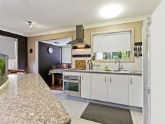  10 Pearen St Clontarf QLD 4019 $450,000 Property Information This renovated split level home is ideal for families, couples sharing or even the home business. With a full kitchen, living and modern bathrooms on each level, the options are limitless. The block is semi split with the house, outdoor entertainment area and a landscaped garden on one section of the land, side access to another large yard and garage or storage shed on the other. This creates plenty of space to park your camper, boat, other toys or machinery. The upstairs living area opens out to a front balcony, the kitchen is modern with a large island bench and the décor is finished in a modern earthy colour scheme.  The master bedroom has a walk in robe, bedroom 2 and 3 have ceiling fans and built in robes. Downstairs living room is air conditioned with a full kitchen, two utility rooms (not legal height but currently used as bedrooms) plus office. At the back of the house is an outstanding covered entertainment area with TV ports, outdoor kitchen area, a landscaped fully fenced yard and a sitting area for the brazier. Features include - Fully fenced yard x 2 - Single lock up garage at rear and carport at front - Two modern bathrooms - Landscaped yard with beautiful corner sitting area - Large outdoor covered entertainment area with TV ports and kitchen sink - 2 x utility rooms and office downstairs - Double gate with side access to huge separate yard - 2 x air conditioning upstairs and 1 downstairs  This unique home won't last long in the current market, register your interest today! Land Size 	 804 sqm Property condition 	 Renovated Property Type 	 House House style 	 Highset Garaging / carparking 	 Single lock-up, Open carport Kitchen 	 Modern Main bedroom 	 Walk-in-robe Bedroom 2 	 Built-in / wardrobe Bedroom 3 	 Built-in / wardrobe Additional rooms 	 Rumpus Fencing 	 Fully fenced Grounds 	 Backyard access Locality 	 Close to transport, Close to schools, Close to shops 