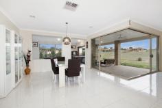  56 Valley Drive Hidden Valley VIC 3756  $595,000 to $655,000 EXECUTIVE ENTERTAINING Set on 5698m2 this magnificent two year old executive home offers space and style on a grand scale. Greeting you inside the large entry hall is a functional small lounge retreat or home office opposite the huge master suite which consists of a stunning en suite and fitted walk in dressing room. Ample storage and a walk through butlers pantry synchronise functionality with style as the feature packed kitchen leads to a large open family and dining room all adjoining the al fresco entertaining area by corner stack sliding doors. The rumpus room features a wet bar and servery to the al fresco and takes in the fantastic vista. Large bedrooms fitted with built in wardrobes and family bathroom complete this magnificent offering. Features include powder room, walk in linen closet, gas ducted heating, evaporative cooling, ducted vacuum, double lock up garage and much more. Price Guide: $595,000 to $655,000   |  Type: House  |  ID #303343 