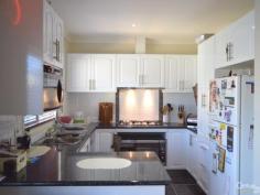  17 Parmentier Way Pakenham VIC 3810 $440,000 Magnificent Home AND Top Location! Inspection Times: Sat 04/07/2015 02:00 PM to 02:30 PM Family friendly location just a stroll to Lakeside Primary School and walking distance to 926 bus, Cardinia Road Train Station, St Francis Xavier College, parks, shops and sporting facilities and with easy access to the major freeways. This magnificent double storey home sits high and proud in a lovely street amongst other quality homes and has all the bells and whistles to make life that much more enjoyable! Upstairs boasts 2 good sized bedrooms with built-in-robes as well as modern family bathroom, downstairs is the air conditioned master bedroom with walk-in-robe and full ensuite bathroom, 4th bedroom (or home office/study), separate lounge, generous open plan living room and dining area adjoining light & bright kitchen with 900mm cooktop and oven, as well as dishwasher. Ducted heating and 3 split system airconditioners take care of year round comfort. Extra features include timber venetians, polished wood flooring, gloss tiling to wet areas, down-lighting and neutral tones throughout. Central vacuuming system makes cleaning a breeze and security cameras and full alarm system give you peace of mind. Paved outdoor entertaining area set in low maintenance gardens and a double remote garage with internal and rear access completes this very impressive package!  