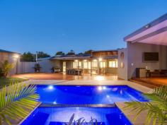  2 Ridge Ct Rye VIC 3941 $780,000 - $830,000 Tranquil Bali in your Backyard What if you could get home from a hard days work, walk into your back yard and transport into Bali, well at this property, you can! This stunning home screams relax, sit back and enjoy. Beautifully renovated through out, every aspect of this home would satisfy the fussiest of buyers. Comprising 4 bedrooms, the master bedroom fit for a king with ensuite, wardrobes galore and its own private outdoor bath and deck, 3 bathrooms in total, 2 living areas, separate dining and designer kitchen with dishwasher and gas cooking. Fit for day or night, the stunning entertaining area features slick decking, pool and spa, undercover BBQ and out door lounge with plasma TV. This property truly is unique in every aspect and also features polished timber flooring, roll top brush fence, huge garage, extra high carport to fit the boat in, bore water, tank water, now connected to main sewer line, coonara and split system air conditioning all set on 1613 sqm approx. If resort style living is what you are after, this may be the property for you. 