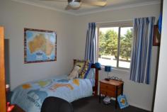  59 Skuses Rd Allansford VIC 3277  $599,000 City living in the Country Consider this very well presented 3 year old home on a quiet country road, it has expansive district views and everything a new family home offers. Comprising 4 bedrooms plus study, master with ensuite and WIR, central bathroom (separate bath and shower) and large laundry. The open plan living area features a well equipped kitchen with large walk in pantry, gas cook top, electric oven, dishwasher and breakfast bar, light filled dining area and living space. There is a second living room which is ideally set up for a parents retreat. Quality is evident throughout the home including tiled flooring in the traffic areas and carpet through the quiet areas. Ducted central heating, reverse cycle air conditioning and 3.5 kw solar power are an added feature. The double garage has an auto door and direct access to the home. A north facing sheltered patio, presents as a third living space ideal for entertaining and enjoying the large garden . The approx. 5 acres are subdivided into 3 well fenced paddocks protected by cypress plantations. A 10m x 7m colourbond shed comes with a mezzanine for extra storage. Water is never a problem, with 2 x 22,500 litre rain water tanks backed up with a bore & 22,500 litre tank. If you are looking for a quality lifestyle property away from the hustle and bustle but close enough to town, this property is well worth an inspection Price For Sale $599,000 Category House 