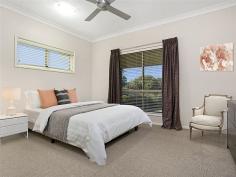  60 Ridley Rd Bridgeman Downs QLD 4035 $695,000 Property Information This rendered brick home has been thoughtfully designed and tastefully finished with contemporary décor for modern family living on a generous 700m2 block. You will love the spacious living room and modern kitchen with gas cooktop, Caesar stone bench tops, soft close drawers and stainless steel appliances.  The kitchen and dining space opens out to the huge covered entertainment area featuring a swimming pool size spa bath. This area has been beautifully finished with timber decking and glass swimming pool safety fencing. The king size master bedroom boasts a generous en-suite with double sink, lots of cupboard space and an oversized shower head. Through the en-suite you will find a huge walk in wardrobe room. The remaining three bedrooms are complete with ducted A/C, ceiling fans and built in robes. There is a separate office accessed via the garage.  Finished with all the extras, this house has ducted air conditioning throughout, a security alarm system, crimsafe screens and an electric front gate. Ridley Road is in a fantastic location, located in popular Bridgeman Downs close to shopping, schools, public transport and near the border of "The Wineries" part of Carseldine. Features include - Double lock up garage with auto door - Plenty of room for off street parking - Separate office accessed via garage - Solar power  - Ducted air conditioning (including the room near the garage) - Crimsafe security screens - Electric security gate - 2 water tanks and a garden shed - Low maintenance, landscaped gardens - Close to bus stops - Road speed limit is just 50km - Herb garden at the back - Plenty of storage space/cupboards - Spa/swimming pool This stunning home won't last long, register your interest today! Land Size 	 700 sqm Approx year built 	 1995 Property condition 	 Renovated Property Type 	 House House style 	 Lowset Garaging / carparking 	 Double lock-up Heating / Cooling 	 Gas bottled Kitchen 	 Modern Main bedroom 	 King and Walk-in-robe Laundry 	 Separate Outdoor living 	 Entertainment area (Covered), Pool (Security fencing), Spa Fencing 	 Fully fenced Grounds 	 Tidy Garden 	 Garden shed (Number of sheds: 1) Water supply 	 Town supply, Tank Locality 	 Close to schools, Close to transport, Close to shops 