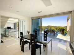  36 Gurney Cres Seaforth NSW 2092 $11,000,000 The Ultimate Harbourside Mansion This incredibly substantial and architecturally designed master built mansion and has been designed with extreme comfort, premium quality and luxury in mind while privately nestled amongst the trees on a double lot. Prominently positioned with almost 1000m2 of luxurious modern living across three levels. It is unsurpassed in design, quality and location. The beautiful surroundings are further embraced with 20-metre wide terraces on each of the three levels. The home offers spectacular 210-degree panoramic views of Middle Harbour from every level. The tranquil views of untouched waterfront reserves, secluded harbours and endless pristine blue waters create the impression that you are living in a private paradise, while being only 30 minutes from Sydney CBD, and just moments from Seaforth shops, restaurants, schools, parks, golf courses, and transport to the city and the popular northern beaches. - 2 Gourmet kitchens & one Kitchenette - Entertainment room and home theatre with home-wide audio system - Heated flooring, double sided gas fireplace - Fully approved three bedroom guest house - separate accommodation - Specially designed home gymnasium - Wine cellar - holding 1200+ bottles - C-Bus system with colour touch screen - Fully integrated security system with infra-red cameras - Sauna fully imported from Finland - Eco friendly BASIX Certified home - Glamorous infinity gas heated 11 metre wet edge pool with Jacuzzi and two spas - Koi fishponds, water features, landscaped grounds - Boat moorings and a fenced public sea pool in a waterfront reserve - Two street access Inspect by Appointment - Mark Clarke 0407 600 211 