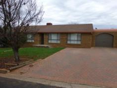  6 Basil Ave Parkes NSW 2870 $275,000 Quiet & Comfortable Situated in a quiet cul.d.sac, this brick home has four bedrooms, open plan lounge/dining area, spacious kitchen with walk-in pantry, three way bathroom, large family room with split system and doors opening onto entertaining area, there is also a Balinese style entertaining area, colourbond garage and workshop and secure yard.The home has new flooring and fresh paint, ducted evaporative a/c and gas heating. DETAILS ID #: 0000265300 Price: $275,000 Type: House Bed: 4    Bath: 1    Car: 1     Land Area: 636 sqm (approx) 