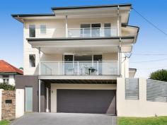  1 Miriam St Holland Park West QLD 4121 Trendy, inner city living comes to the burbs!!!! Superior Tri Level, Executive Freehold Townhouse. It's all about lifestyle! Designed for the modern family unit. Perfect for entertaining friends & family. All living spaces merge seamlessly with outdoor entertaining areas overlooking special district views providing a relaxed and peaceful environment. Entering this property you are greeted with the beautifully polished timber staircase leading to the first floor which is truly the heart of the home! It exudes elegance and quality boasting a designer style kitchen with an abundance of special features including caesar stone benchtops, master chef appliances and everything you need to make cooking a delight.  There are three generous bedrooms on the third level. The master bedroom complimented with walk in robe, ensuite and with city glimpses from your own private deck perfectly positioned to capture the Northeast breezes for those hot summer nights. Features Include: Private corner position Full ducted air-conditioning Monster double garage An abundance of storage on every level Crimsafe security screens Gas cook top and hot water Views that can't be built out Low maintenance  Freehold!! No Body Corp Fees  Only 6yrs old Will rent in excess of $600 p/w Take advantage of generous depreciation schedules Brisbane City Council Park and Ride at your door step Only 3 houses in the development 10-15mins to Brisbane CBD Walking distance to Doctor Surgery & Big Top Shopping Centre Less than 10mins to Westfield Garden City & Carindale Not to be missed. This is something special. Inspection an absolute must!!!   Property Snapshot  Property Type: Townhouse Construction: Rendered Block Zoning: Residential B R4 Land Area: 205 m2 