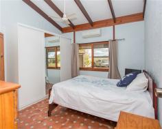  955 Walkerston Homebush Rd Sandiford QLD 4740 Property Information Auction Date: Monday 24 Aug 12:00 PM (Mackay Harcourts Office) THIS beautiful, rustic stone house with large living areas near Palmyra presents a great opportunity for a lucky buyer to get over an acre of flat land just a 15-minute drive from town at an affordable price.  With soaring cathedral ceilings, silky oak sliding doors that run the length of the house and quality construction by a stonemason, this property offers something different.  The big 4,698sq m block is a blank canvas and is just waiting for someone who wants to put in a massive shed to accommodate vehicles and other equipment.  The L-shaped house has an enormous open-plan family room with a massive lounge area, a separate dining space and a huge eat-in kitchen.  The high ceilings create a feeling of extra space and the rosewood sliding doors that lead to the covered verandas and entertainment area provide gorgeous natural light.  The bedrooms are a good size and two have split-system air-conditioners but the light-filled main bedroom is super-sized and comes with a walk-through wardrobe. The property would be ideal for a family that wants big living areas and the breathing space that over an acre of land provides but also needs something affordable that is close enough to town to have easy access to schools, shops and work places.  The owner is motivated to sell and is realistic about having to meet the current market so there is a real opportunity for a buyer to get something special with heaps of breathing space at a very affordable price.  Land Size 	 4698 sqm Approx year built 	 1985 Property condition 	 Good Property Type 	 House House style 	 Lowset, Colonial Garaging / carparking 	 Open carport Construction 	 Stone Joinery 	 Timber Roof 	 Colour steel Walls / Interior 	 Gyprock, Concrete Flooring 	 Floating Window coverings 	 Drapes Heating / Cooling 	 Ceiling fans Property features 	 Safety switch Kitchen 	 Open plan Living area 	 Open plan Main bedroom 	 King Bedroom 2 	 Double Bedroom 3 	 Single Main bathroom 	 Spa bath, Separate shower Laundry 	 Separate Views 	 Rural Aspect 	 North, East Outdoor living 	 Entertainment area (Covered and Paved), BBQ area (with lighting) Fencing 	 No fencing Land contour 	 Flat Grounds 	 Tidy Water heating 	 Electric Water supply 	 Bore Sewerage 	 Septic 