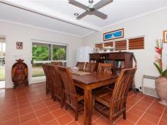  12 Ribbon Ave Port Douglas QLD 4877 TROPICAL, FUNKY & FUNCTIONAL A refreshing design allowing outdoor access from all bedrooms AND the main living area is one aspect of this practically designed family home.  The outdoor area itself combines depth and breadth under cover catching the late afternoon sun whilst looking to the uniquely shaped dark pebble crete pool with sumptuous waterfall to add to the relaxed feel. There is absolutely plenty of room for kids and pets to run and play whilst providing just enough garden space to enjoy the tropical feel whilst not creating major maintenance and if entertainment forms part of your life the oversized pool edge offers further foundation for seating, tables, bbq, shade sail or more. Internally the gourmet kitchen has been crafted with quality timber finishes and impressive stone tops combining frosted glass doors to house glassware and more. The appliances compliment the package that serves the open plan dining and lounge with convenience timber louvers for light and air flow. All air conditioned bedrooms offer storage via built in robes and both oversized bathrooms (shared or the master ensuite) impress with modern design young in age and high in practicality. Solar heats your water and further solar subsidises your power needs and keeps living costs to a minimum, perhaps even further the front garden vegie patch to fulfil self sufficiency.  The property offers a large double garage with extra depth and a near by purpose built storage area perhaps also suited to garden atrium and the yards are fenced all round for security with walking access either side or rear gate for quick access to school, shops and more. With the sellers about to commit to their next build an immediate sale is sought, hence AUCTION; opening up your opportunity to enjoy this quiet and practically located street position with immediacy.   Property Snapshot  Property Type: House Aspect Views: Overlooks the pool. Construction: Rendered Block Zoning: 51 Land Area: 800 m2 Features: Air Conditioning Built-In-Robes Ceiling Fans Close to Schools Close to Shops/Restaurants Close to Transport Dishwasher Ensuite Established Gardens Fenced Back Yard 