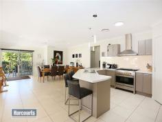  9 Pardalote Dr Brookwater QLD 4300 $759,000 Rare opportunity to acquire this amazing property located to provide a stunning aspect whilst ensuring total privacy on a nicely elevated 1,068sqm block of land in the Panorama Precinct. This Brookwater residence has been designed, built & beautifully appointed to maximize space, capture natural light & provide numerous options for indoor & outdoor entertaining & living zones.  As soon as you enter 9 Pardalote Drive you can sense that space & style has been seamlessly achieved with tasteful decorating & the use of high ceilings.  The property has been constructed with separate living spaces in mind. You have a generous sized study & three bedrooms (all with ducted a/c & Built in Robes), main bathroom (with separate shower & bath), plus a central family/games room at the front of the house along with the double garage, numerous storage areas and a laundry area that will definitely impress.  You then walk down the foyer & have a generous sized formal lounge/media room that overlooks the pool area & then the house flows to a huge open plan living/dining area with the kitchen truly stealing the show. Quality 900mm Stainless Steel Blanco 5 burner gas cook top + oven, Miele dishwasher, oversized Walk in Pantry & a wrap-around breakfast bar with double sinks are just a few of the kitchen highlights. The main bedroom actually offers 2 Walk in Robes, tastefully decorated ensuite& is positioned at the rear of the house for total privacy. A third day use bathroom is situated close to the living/dining/kitchen area for easy access.  Outside entertaining is sensational with a huge undercover alfresco patio area that has power, lighting & fans and provides the perfect place for weekend barbecues whilst watching the kids play in the Saltwater Pebblecrete Lap Pool that was only added a couple of years ago to complete this Brookwater Beauty.  The property is pretty as a picture & has so many extras like easy maintenance gardens, large rainwater tank, ducted air-conditioning, security screens & security alarm, roller blinds, solar/gas combo hot water system & tiles/timber flooring throughout. This amazing Brookwater property is the complete package of size, style & position with the owners pricing this Pardalote property to sell quickly. For your private inspection or Open Home times please call me before you miss this cracking home. Floor Area 	 335 sqm Land Size 	 1068 sqm Tenure 	 Freehold Property condition 	 Excellent Property Type 	 House House style 	 Contemporary Garaging / carparking 	 Double lock-up Roof 	 Colour steel Flooring 	 Floating and Tiles Window coverings 	 Blinds Heating / Cooling 	 Reverse cycle a/c, Ducted, Ceiling fans, Gas bottled Electrical 	 TV aerial Property features 	 Security system Chattels remaining 	 Blinds, Fixed floor coverings, Light fittings, Stove, TV aerial Kitchen 	 Modern, Dishwasher, Rangehood, Double sink, Breakfast bar, Microwave, Gas bottled and Finished in Laminate Living area 	 Formal dining, Separate living, Open plan, Formal lounge Main bedroom 	 King, Walk-in-robe, Heating / air conditioning and Ceiling fans Ensuite 	 Separate shower Bedroom 2 	 Double, Built-in / wardrobe and Heating / air conditioning Bedroom 3 	 Double, Built-in / wardrobe and Heating / air conditioning Bedroom 4 	 Double, Built-in / wardrobe and Heating / air conditioning Additional rooms 	 Office / study, Media Laundry 	 Separate Views 	 Bush Outdoor living 	 Entertainment area (Covered and Concrete), Pool (Inground, Pebble and Salt), Garden, BBQ area (with lighting and with power) Fencing 	 Partial Land contour 	 Flat to sloping Grounds 	 Tidy, Landscaped / designer Water heating 	 Gas, Solar Water supply 	 Town supply, Tank Sewerage 	 Mains Locality 	 Close to shops, Close to transport, Close to schools Fixtures/chattels excluded 	 Double Door Fridge 