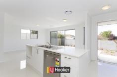  76-78 Uriarra Road Queanbeyan NSW 2620 $437,500 - $445,000 Brand new & ready to move in! A stunning new boutique development of 7 luxurious 3 bedroom townhouses. These townhouses are perfectly situated in Crestwood, only minutes to Queanbeyan's CBD. They provide luxurious and spacious living with an affordable price tag.  There are 3 different floor plans available, each one offering spacious open plan living and dining areas, 3 bedrooms with built in robes, ensuite and a double garage with remote door and internal access. The kitchens have been fitted with stone bench tops, Fisher and paykel stainless steel appliances, dishwasher and gas cooktops.  The bathrooms are stunning with floor to ceiling tiles and the latest fitting and fixtures.  Each townhouse has its own large architecturally designed courtyard including an outdoor entertaining area. Landscaping is already done for you and they come complete with a 2000 litre water tank and even a garden shed. Entertaining and living areas have all been designed to face north. Be sure to call Jason for an inspection today on 0425 366 663  Features: -Close to local shops, schools and amenities -Bus stop right on the corner -Fisher and Paykel appliances -Stone bench tops -North facing entertaining areas -Floor to ceiling bathroom tiles -Tiles to living areas -Large architecturally designed courtyards -Rain water tank and garden shed -Fully landscaped -Double garage with remote access  -New construction Have you got the BUG? Join our propertybug email service for a first look at our new listings.   Property Snapshot  Property Type: Townhouse 