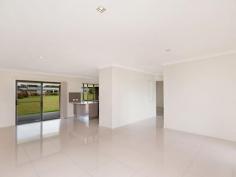  27 McKenzie Dr Gulmarrad NSW 2463 $410,000 Modern Well Priced Family Home Modern and well planned, this as new low set home offers everything you need whether you are looking to retire or secure your first home. The wide tiled entry way extends through to the open family room and kitchen which offers plenty of cupboard space and overlooks the big back patio area. Internal access from the double garage provides easy access for the groceries while the separate guest room at this end of the house enjoys the privacy of being at the opposite end of the house from the other bedrooms. A third toilet is conveniently located in the laundry while the central media room is the perfect space to set up the home theater. All of the bedrooms are quite spacious and include built-in wardrobes. The main bedroom features an ensuite and opens to the rear patio area. The main bathroom is also well appointed and includes a bath and shower while storage space is on offer in the hall way. Positioned on an acre in a neighbourhood where you are surrounded by quality homes, this is a property that has a lot to offer. You will be left wanting for very little at 27 McKenzie Drive. An inspection is an absolute must. 