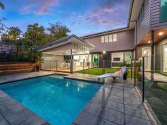  14 Mareeba Rd Ashgrove QLD 4060 Easy Living in the Avenues' Located in the highly sought after avenues of Ashgrove, this exceptionally comfortable home offers an elegant, contemporary design ideal for relaxed family living. At a glance • 	 Large glass windows/doors allow you to take advantage of natural light & air flow • 	 Chic kitchen with stone benches & quality appliances • 	 Expansive family living and dining area • 	 Separate lounge upstairs with study nook • 	 Four generously proportioned bedrooms with built-in robes  • 	 Lavish master suite - complete with ensuite & impressive walk-in robe • 	 Three bathrooms • 	 Separate laundry with ample storage • 	 High ceilings and polished timber floors • 	 Ducted - zoned air-conditioning and fans throughout  • 	 Intercom • 	 Solar panels (3kw) • 	 Family friendly level North-Easterly facing yard and pool area • 	 Entertainers deck • 	 Accommodation for two cars and storage area  • 	 Only 5kms from the city • 	 Walking distance to parks, bike/walk tracks, library, bus & Ashgrove shopping precinct • 	 Great schools nearby include Mt St Michaels, Marist, St Finbarrs, Oakleigh, Ashgrove State and Mater Dei Surrounded by Ashgrove's finest homes, this inspection is a must. For all enquiries contact Brigette Righton 