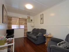  109 Kroombit St Biloela QLD 4715 $310,000 Price Reduced! Looking at kicking off or growing your investment portfolio? Then here is the perfect opportunity to do so. Two, 2 bedroom units in this complex. Kitchen, dining and separate air-conditioned lounge. Main bedroom has air-conditioning and built-in robes. Each unit has its own separate laundry and covered car accommodation. Large, fully fenced back yards with 3x3 lawn lockers. Close to town....both units are tenanted and yielding a $450/week return. Call the agent to arrange your inspection today 