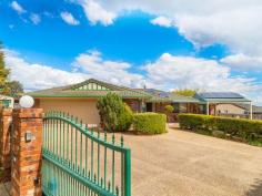  7 Atkinson Cl Coopers Plains QLD 4108 Stunning, Quietly Located Family Home! If I have seen a better maintained and presented family home, I certainly can't remember. Peacefully located at the end of a cul-de-sac and positioned in the heart of the very popular Coopers Plains 'Village' this stunning four bedroom, two bathroom home awaits your expression of interest. Owing to the large 856m2 block size the original builders were able to fit a magnificent home on one easy care level, that encompasses two separate living area, four generous sized bedrooms, an office and a large double garage. Internally the home has been thoughtfully designed to maximise flow and natural light, all bedrooms are generous sized and the master bedroom has both a large walk-in robe and en-suite. Conveniently the office is located off the second living area which is the perfect working environment to operate from home. With the open plan kitchen being recently renovated to include polished granite benchtops and new appliances simply move in and enjoy, all the hard work has been done. Externally the massive Al fresco style covered patio area is perfectly positioned to oversee both front and rear play areas and also a great place to entertain or simply relax with a beverage or two. The property contains enough room for additional vehicles and with a powered rear 6 x 3 storage shed you have everything you need in a property.. Features include; Solar power hot water and home Fully fenced and private with electronic front gate Full security screens and blinds throughout Split system air conditioning in master bedroom and fans throughout Working fireplace in lounge Because the property is perfectly located you can walk to both bus and train from here, a stones throw will take you to two local parks and shops and schools are also close by. A short drive will take you to QE2 hospital, Mount Gravatt and Sunnybank shopping centres or the freeway into the city. This property ticks all my boxes and I'm sure it will tick yours so please come along to the open for inspection. Coopers Plains is one of Brisbane's fastest moving suburbs and I promise this one won't last long! 