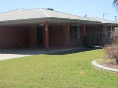  18 Madison Terrace Roma QLD 4455 $399,000 Modern Finishes Throughout This lowset brick veneer home has been renovated with modern features throughout. Very large master bedroom includes a walk in robe and ensuite with shower toilet and vanity unit. Formal lounge room with brick feature wall and archway. All other bedrooms have built in cupboards. Stunning white tiles throughout the living areas. Evaporative air conditioning throughout, ceiling fans and gas bayonnets installed. Open plan kitchen, dining and lounge room. The modern kitchen includes a dishwasher, electric stove, oven and rangehood. Second bathroom has separate shower and bathtub, and vanity unit. The toilet is separate off the laundry. Immaculate lawns and gardens and a fully fenced house yard. Single lockup garage and double undercover carport. Currently rented for $500 per week until 06.09.2015. 