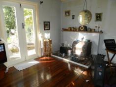  15 Werona St Lawson NSW 2783 $399,950 Norman Lindsay Style Gardens With the most private of settings sits this gorgeous cottage. With windows having the vantage points of the beautiful gardens. Modern kitchen with stainless appliances. Lounge with polished floors, combustion heater and French doors opening to outside. Main bed is large with built-ins and door to courtyard. Deep bathtub, and a sunny view from verandah. Lots of garden arches and even a wishing well. Approx. 963sqm, walk to station and shops.   Inspection Times Contact agent for details Features Built In Robes Dishwasher Floorboards Land Size 963 m2 