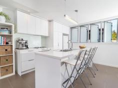  5/91 Mildmay St Fairfield QLD 4103 Tri-Level Townhouse with Large Backyard! Completed in 2011 this contemporary home is situated at the rear of the complex away from the street, and is all about size and location. With elevated views, this townhouse has no shortage of windows and natural light. Downstairs features single remote lockup garage, separate laundry and storage. You also access your own large private backyard from here, surrounded by established tall vegetation, however still open to sunshine. Apart from the perfectly manicured grassed area you also have an undercover paved section ideal for outdoor setting and hanging laundry. Upstairs is your open plan kitchen, dining and living area. This floor also opens up to the large balcony with a gorgeous leafy outlook. The kitchen is modern and has a large barstool bench, perfect for guest entertaining. As well as generous cupboard space, quality appliances and dining area this home has some serious X-factor. Third level has 2 large bedrooms with mirrored built ins. Master with ensuite and the second bathroom has a bath. Features include: • 	 Ducted air-conditioning  • 	 Ceiling fans in both bedrooms and on balcony  • 	 Intercom • 	 Gas cooktop • 	 Remote lockup garage • 	 Retractable shade cloth blind for balcony • 	 Large private backyard • 	 Space for lounge and dining • 	 Blockout curtains  • 	 Pet friendly (subject to application) • 	 Fibre internet Close to trainstation, bus stops, cafes and shops. Fairfield Gardens Shopping Centre is less than a 200m walk. Just over 3 kms bike ride to University of Queensland via the Green Bridge. Close to Junction Park & Yeronga state schools. And not to mention just over 10 mins drive to the CBD. 