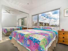  5/91 Mildmay St Fairfield QLD 4103 Tri-Level Townhouse with Large Backyard! Completed in 2011 this contemporary home is situated at the rear of the complex away from the street, and is all about size and location. With elevated views, this townhouse has no shortage of windows and natural light. Downstairs features single remote lockup garage, separate laundry and storage. You also access your own large private backyard from here, surrounded by established tall vegetation, however still open to sunshine. Apart from the perfectly manicured grassed area you also have an undercover paved section ideal for outdoor setting and hanging laundry. Upstairs is your open plan kitchen, dining and living area. This floor also opens up to the large balcony with a gorgeous leafy outlook. The kitchen is modern and has a large barstool bench, perfect for guest entertaining. As well as generous cupboard space, quality appliances and dining area this home has some serious X-factor. Third level has 2 large bedrooms with mirrored built ins. Master with ensuite and the second bathroom has a bath. Features include: • 	 Ducted air-conditioning  • 	 Ceiling fans in both bedrooms and on balcony  • 	 Intercom • 	 Gas cooktop • 	 Remote lockup garage • 	 Retractable shade cloth blind for balcony • 	 Large private backyard • 	 Space for lounge and dining • 	 Blockout curtains  • 	 Pet friendly (subject to application) • 	 Fibre internet Close to trainstation, bus stops, cafes and shops. Fairfield Gardens Shopping Centre is less than a 200m walk. Just over 3 kms bike ride to University of Queensland via the Green Bridge. Close to Junction Park & Yeronga state schools. And not to mention just over 10 mins drive to the CBD. 