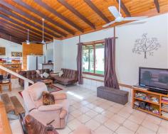  955 Walkerston Homebush Rd Sandiford QLD 4740 Property Information Auction Date: Monday 24 Aug 12:00 PM (Mackay Harcourts Office) THIS beautiful, rustic stone house with large living areas near Palmyra presents a great opportunity for a lucky buyer to get over an acre of flat land just a 15-minute drive from town at an affordable price.  With soaring cathedral ceilings, silky oak sliding doors that run the length of the house and quality construction by a stonemason, this property offers something different.  The big 4,698sq m block is a blank canvas and is just waiting for someone who wants to put in a massive shed to accommodate vehicles and other equipment.  The L-shaped house has an enormous open-plan family room with a massive lounge area, a separate dining space and a huge eat-in kitchen.  The high ceilings create a feeling of extra space and the rosewood sliding doors that lead to the covered verandas and entertainment area provide gorgeous natural light.  The bedrooms are a good size and two have split-system air-conditioners but the light-filled main bedroom is super-sized and comes with a walk-through wardrobe. The property would be ideal for a family that wants big living areas and the breathing space that over an acre of land provides but also needs something affordable that is close enough to town to have easy access to schools, shops and work places.  The owner is motivated to sell and is realistic about having to meet the current market so there is a real opportunity for a buyer to get something special with heaps of breathing space at a very affordable price.  Land Size 	 4698 sqm Approx year built 	 1985 Property condition 	 Good Property Type 	 House House style 	 Lowset, Colonial Garaging / carparking 	 Open carport Construction 	 Stone Joinery 	 Timber Roof 	 Colour steel Walls / Interior 	 Gyprock, Concrete Flooring 	 Floating Window coverings 	 Drapes Heating / Cooling 	 Ceiling fans Property features 	 Safety switch Kitchen 	 Open plan Living area 	 Open plan Main bedroom 	 King Bedroom 2 	 Double Bedroom 3 	 Single Main bathroom 	 Spa bath, Separate shower Laundry 	 Separate Views 	 Rural Aspect 	 North, East Outdoor living 	 Entertainment area (Covered and Paved), BBQ area (with lighting) Fencing 	 No fencing Land contour 	 Flat Grounds 	 Tidy Water heating 	 Electric Water supply 	 Bore Sewerage 	 Septic 