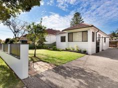  22 Rosebank Ave Kingsgrove NSW 2208 Quality Family Residence Situated in one of the most sought after streets in Kingsgrove, this beautiful and spacious three bedroom home is perfect for any family. This solid freestanding home includes a modern kitchen, polished timber floors, large open plan living and dining area, separate family room with combustion fireplace and air conditioning, sunroom/study off front bedroom, built-in-robes, large north facing rear private backyard perfect for the kids, side drive with secure carport and garage, plus many other features. The neutral interiors perfectly complement the casual, leisurely layout, which enables versatile low maintenance living with the utmost comfort and functionality. For further information contact Peter Tsekenis 0414 660 838 or Elia Economou 0414 889 111. 