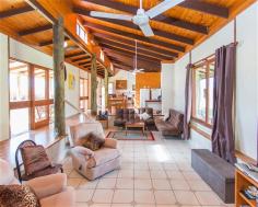  955 Walkerston Homebush Rd Sandiford QLD 4740 Property Information Auction Date: Monday 24 Aug 12:00 PM (Mackay Harcourts Office) THIS beautiful, rustic stone house with large living areas near Palmyra presents a great opportunity for a lucky buyer to get over an acre of flat land just a 15-minute drive from town at an affordable price.  With soaring cathedral ceilings, silky oak sliding doors that run the length of the house and quality construction by a stonemason, this property offers something different.  The big 4,698sq m block is a blank canvas and is just waiting for someone who wants to put in a massive shed to accommodate vehicles and other equipment.  The L-shaped house has an enormous open-plan family room with a massive lounge area, a separate dining space and a huge eat-in kitchen.  The high ceilings create a feeling of extra space and the rosewood sliding doors that lead to the covered verandas and entertainment area provide gorgeous natural light.  The bedrooms are a good size and two have split-system air-conditioners but the light-filled main bedroom is super-sized and comes with a walk-through wardrobe. The property would be ideal for a family that wants big living areas and the breathing space that over an acre of land provides but also needs something affordable that is close enough to town to have easy access to schools, shops and work places.  The owner is motivated to sell and is realistic about having to meet the current market so there is a real opportunity for a buyer to get something special with heaps of breathing space at a very affordable price.  Land Size 	 4698 sqm Approx year built 	 1985 Property condition 	 Good Property Type 	 House House style 	 Lowset, Colonial Garaging / carparking 	 Open carport Construction 	 Stone Joinery 	 Timber Roof 	 Colour steel Walls / Interior 	 Gyprock, Concrete Flooring 	 Floating Window coverings 	 Drapes Heating / Cooling 	 Ceiling fans Property features 	 Safety switch Kitchen 	 Open plan Living area 	 Open plan Main bedroom 	 King Bedroom 2 	 Double Bedroom 3 	 Single Main bathroom 	 Spa bath, Separate shower Laundry 	 Separate Views 	 Rural Aspect 	 North, East Outdoor living 	 Entertainment area (Covered and Paved), BBQ area (with lighting) Fencing 	 No fencing Land contour 	 Flat Grounds 	 Tidy Water heating 	 Electric Water supply 	 Bore Sewerage 	 Septic 