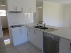  18 Madison Terrace Roma QLD 4455 $399,000 Modern Finishes Throughout This lowset brick veneer home has been renovated with modern features throughout. Very large master bedroom includes a walk in robe and ensuite with shower toilet and vanity unit. Formal lounge room with brick feature wall and archway. All other bedrooms have built in cupboards. Stunning white tiles throughout the living areas. Evaporative air conditioning throughout, ceiling fans and gas bayonnets installed. Open plan kitchen, dining and lounge room. The modern kitchen includes a dishwasher, electric stove, oven and rangehood. Second bathroom has separate shower and bathtub, and vanity unit. The toilet is separate off the laundry. Immaculate lawns and gardens and a fully fenced house yard. Single lockup garage and double undercover carport. Currently rented for $500 per week until 06.09.2015. 