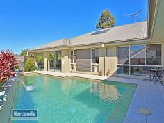  9 Pardalote Dr Brookwater QLD 4300 $759,000 Rare opportunity to acquire this amazing property located to provide a stunning aspect whilst ensuring total privacy on a nicely elevated 1,068sqm block of land in the Panorama Precinct. This Brookwater residence has been designed, built & beautifully appointed to maximize space, capture natural light & provide numerous options for indoor & outdoor entertaining & living zones.  As soon as you enter 9 Pardalote Drive you can sense that space & style has been seamlessly achieved with tasteful decorating & the use of high ceilings.  The property has been constructed with separate living spaces in mind. You have a generous sized study & three bedrooms (all with ducted a/c & Built in Robes), main bathroom (with separate shower & bath), plus a central family/games room at the front of the house along with the double garage, numerous storage areas and a laundry area that will definitely impress.  You then walk down the foyer & have a generous sized formal lounge/media room that overlooks the pool area & then the house flows to a huge open plan living/dining area with the kitchen truly stealing the show. Quality 900mm Stainless Steel Blanco 5 burner gas cook top + oven, Miele dishwasher, oversized Walk in Pantry & a wrap-around breakfast bar with double sinks are just a few of the kitchen highlights. The main bedroom actually offers 2 Walk in Robes, tastefully decorated ensuite& is positioned at the rear of the house for total privacy. A third day use bathroom is situated close to the living/dining/kitchen area for easy access.  Outside entertaining is sensational with a huge undercover alfresco patio area that has power, lighting & fans and provides the perfect place for weekend barbecues whilst watching the kids play in the Saltwater Pebblecrete Lap Pool that was only added a couple of years ago to complete this Brookwater Beauty.  The property is pretty as a picture & has so many extras like easy maintenance gardens, large rainwater tank, ducted air-conditioning, security screens & security alarm, roller blinds, solar/gas combo hot water system & tiles/timber flooring throughout. This amazing Brookwater property is the complete package of size, style & position with the owners pricing this Pardalote property to sell quickly. For your private inspection or Open Home times please call me before you miss this cracking home. Floor Area 	 335 sqm Land Size 	 1068 sqm Tenure 	 Freehold Property condition 	 Excellent Property Type 	 House House style 	 Contemporary Garaging / carparking 	 Double lock-up Roof 	 Colour steel Flooring 	 Floating and Tiles Window coverings 	 Blinds Heating / Cooling 	 Reverse cycle a/c, Ducted, Ceiling fans, Gas bottled Electrical 	 TV aerial Property features 	 Security system Chattels remaining 	 Blinds, Fixed floor coverings, Light fittings, Stove, TV aerial Kitchen 	 Modern, Dishwasher, Rangehood, Double sink, Breakfast bar, Microwave, Gas bottled and Finished in Laminate Living area 	 Formal dining, Separate living, Open plan, Formal lounge Main bedroom 	 King, Walk-in-robe, Heating / air conditioning and Ceiling fans Ensuite 	 Separate shower Bedroom 2 	 Double, Built-in / wardrobe and Heating / air conditioning Bedroom 3 	 Double, Built-in / wardrobe and Heating / air conditioning Bedroom 4 	 Double, Built-in / wardrobe and Heating / air conditioning Additional rooms 	 Office / study, Media Laundry 	 Separate Views 	 Bush Outdoor living 	 Entertainment area (Covered and Concrete), Pool (Inground, Pebble and Salt), Garden, BBQ area (with lighting and with power) Fencing 	 Partial Land contour 	 Flat to sloping Grounds 	 Tidy, Landscaped / designer Water heating 	 Gas, Solar Water supply 	 Town supply, Tank Sewerage 	 Mains Locality 	 Close to shops, Close to transport, Close to schools Fixtures/chattels excluded 	 Double Door Fridge 