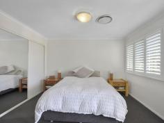  51/139 Pring Street Hendra QLD 4011 Luxury Townhouse at Tea Tree Grove Set at the end of one of Hendra's finest streets is the resort style complex of Tea Tree Grove. Adjacent to Healthworks Fitness Centre, so there is no excuse, we are delighted to present Unit 51. The double storey, 3 bedroom townhouse has been tastefully decorated and embellished to give you a true sense of home, yet with the accompanying low maintenance lifestyle. Positioned at the end of one of the various alley ways, the home is adjacent bushland creating a very private and peaceful space. On the lower level, atop stylish timber laminate flooring is a lounge and dining area, framed with superb white shutters. The adjacent kitchen with breakfast bar is large by townhouse standards, with quality appliances and oodles of bench and cupboard space. Adjacent, through sliding glass doors is the covered rear courtyard, fully paved and bordered by low maintenance gardens and plantings and very private. Here we also find a roller door giving access to the rear of the single garage. On the upper level are the bedrooms, recently recarpeted with the Master Suite at the front of the home with own balcony overlooking bushland, a large ensuite with shower, and a huge mirrored wardrobe. The plantation shutters are repeated here on doors and windows, in keeping with the style and theme of the home. There are 2 further bedrooms, one with two way access to the second bathroom with corner spa bath. The additional embellishments of this delightful townhouse include ducted airconditioning to both levels, drive through single car automated garaging, fully fenced and secure with side access to the rear courtyard, intercom to front gate and nearby a communal barbecue and outdoor dining space set around a village green. The complex is secure, well managed and beautifully maintained, with a delightful and pleasant entrance to the complex through remote controlled gates. Adjacent to Healthworks Fitness Centre, with tennis courts and swimming pool, Thai Inspired Spa and Gymnasium, this is truly a resort lifestyle home. Walking distance to bus and train, Doomben and Eagle Farm Racecourse and minutes to Racecourse Road with its plethora of retail and dining options. Brisbane CBD is just 8 kilometres, and Brisbane Airport a mere 6 kilometers away. Upper Level  1 Master bedroom with built-ins, ensuite & balcony  2 bedrooms, built-ins  Family bathroom Lower Level  Kitchen with dishwasher & gas cooktop  Living area  Dining area  Powder room  Laundry Ducted air conditioning  Intercom to front gate Undercover entertaining area  Singe car garaging  Space for a second car Close to public transport  Close to schools  Close to shops 