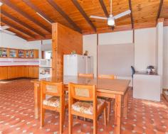  955 Walkerston Homebush Rd Sandiford QLD 4740 Property Information Auction Date: Monday 24 Aug 12:00 PM (Mackay Harcourts Office) THIS beautiful, rustic stone house with large living areas near Palmyra presents a great opportunity for a lucky buyer to get over an acre of flat land just a 15-minute drive from town at an affordable price.  With soaring cathedral ceilings, silky oak sliding doors that run the length of the house and quality construction by a stonemason, this property offers something different.  The big 4,698sq m block is a blank canvas and is just waiting for someone who wants to put in a massive shed to accommodate vehicles and other equipment.  The L-shaped house has an enormous open-plan family room with a massive lounge area, a separate dining space and a huge eat-in kitchen.  The high ceilings create a feeling of extra space and the rosewood sliding doors that lead to the covered verandas and entertainment area provide gorgeous natural light.  The bedrooms are a good size and two have split-system air-conditioners but the light-filled main bedroom is super-sized and comes with a walk-through wardrobe. The property would be ideal for a family that wants big living areas and the breathing space that over an acre of land provides but also needs something affordable that is close enough to town to have easy access to schools, shops and work places.  The owner is motivated to sell and is realistic about having to meet the current market so there is a real opportunity for a buyer to get something special with heaps of breathing space at a very affordable price.  Land Size 	 4698 sqm Approx year built 	 1985 Property condition 	 Good Property Type 	 House House style 	 Lowset, Colonial Garaging / carparking 	 Open carport Construction 	 Stone Joinery 	 Timber Roof 	 Colour steel Walls / Interior 	 Gyprock, Concrete Flooring 	 Floating Window coverings 	 Drapes Heating / Cooling 	 Ceiling fans Property features 	 Safety switch Kitchen 	 Open plan Living area 	 Open plan Main bedroom 	 King Bedroom 2 	 Double Bedroom 3 	 Single Main bathroom 	 Spa bath, Separate shower Laundry 	 Separate Views 	 Rural Aspect 	 North, East Outdoor living 	 Entertainment area (Covered and Paved), BBQ area (with lighting) Fencing 	 No fencing Land contour 	 Flat Grounds 	 Tidy Water heating 	 Electric Water supply 	 Bore Sewerage 	 Septic 