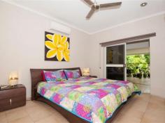  12 Ribbon Ave Port Douglas QLD 4877 TROPICAL, FUNKY & FUNCTIONAL A refreshing design allowing outdoor access from all bedrooms AND the main living area is one aspect of this practically designed family home.  The outdoor area itself combines depth and breadth under cover catching the late afternoon sun whilst looking to the uniquely shaped dark pebble crete pool with sumptuous waterfall to add to the relaxed feel. There is absolutely plenty of room for kids and pets to run and play whilst providing just enough garden space to enjoy the tropical feel whilst not creating major maintenance and if entertainment forms part of your life the oversized pool edge offers further foundation for seating, tables, bbq, shade sail or more. Internally the gourmet kitchen has been crafted with quality timber finishes and impressive stone tops combining frosted glass doors to house glassware and more. The appliances compliment the package that serves the open plan dining and lounge with convenience timber louvers for light and air flow. All air conditioned bedrooms offer storage via built in robes and both oversized bathrooms (shared or the master ensuite) impress with modern design young in age and high in practicality. Solar heats your water and further solar subsidises your power needs and keeps living costs to a minimum, perhaps even further the front garden vegie patch to fulfil self sufficiency.  The property offers a large double garage with extra depth and a near by purpose built storage area perhaps also suited to garden atrium and the yards are fenced all round for security with walking access either side or rear gate for quick access to school, shops and more. With the sellers about to commit to their next build an immediate sale is sought, hence AUCTION; opening up your opportunity to enjoy this quiet and practically located street position with immediacy.   Property Snapshot  Property Type: House Aspect Views: Overlooks the pool. Construction: Rendered Block Zoning: 51 Land Area: 800 m2 Features: Air Conditioning Built-In-Robes Ceiling Fans Close to Schools Close to Shops/Restaurants Close to Transport Dishwasher Ensuite Established Gardens Fenced Back Yard 