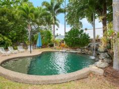  12 Ribbon Ave Port Douglas QLD 4877 TROPICAL, FUNKY & FUNCTIONAL A refreshing design allowing outdoor access from all bedrooms AND the main living area is one aspect of this practically designed family home.  The outdoor area itself combines depth and breadth under cover catching the late afternoon sun whilst looking to the uniquely shaped dark pebble crete pool with sumptuous waterfall to add to the relaxed feel. There is absolutely plenty of room for kids and pets to run and play whilst providing just enough garden space to enjoy the tropical feel whilst not creating major maintenance and if entertainment forms part of your life the oversized pool edge offers further foundation for seating, tables, bbq, shade sail or more. Internally the gourmet kitchen has been crafted with quality timber finishes and impressive stone tops combining frosted glass doors to house glassware and more. The appliances compliment the package that serves the open plan dining and lounge with convenience timber louvers for light and air flow. All air conditioned bedrooms offer storage via built in robes and both oversized bathrooms (shared or the master ensuite) impress with modern design young in age and high in practicality. Solar heats your water and further solar subsidises your power needs and keeps living costs to a minimum, perhaps even further the front garden vegie patch to fulfil self sufficiency.  The property offers a large double garage with extra depth and a near by purpose built storage area perhaps also suited to garden atrium and the yards are fenced all round for security with walking access either side or rear gate for quick access to school, shops and more. With the sellers about to commit to their next build an immediate sale is sought, hence AUCTION; opening up your opportunity to enjoy this quiet and practically located street position with immediacy.   Property Snapshot  Property Type: House Aspect Views: Overlooks the pool. Construction: Rendered Block Zoning: 51 Land Area: 800 m2 Features: Air Conditioning Built-In-Robes Ceiling Fans Close to Schools Close to Shops/Restaurants Close to Transport Dishwasher Ensuite Established Gardens Fenced Back Yard 