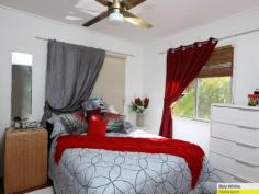  74 Narellan St Arana Hills QLD 4054 $469,000 Leafy Outlook, City Glimpses, Plus a Pool! This highset home is situated in a quiet street in an elevated position, walking distance to all amenities including bus, rail, K-Mart, Club Arana, gym, schools, library and parks. Well presented with polished timber floors, air conditioning, multiple living spaces including a downstairs kids play room (could be used as a fourth bedroom or home office thanks to separate external access). Three generous sized bedrooms upstairs, the master with air conditioning. The home has lots of windows allowing great cross ventilation in those hot summer months. The bathroom has been recently renovated with separate toilet plus a second toilet downstairs. The lounge dining area is open plan and is complemented by the addition of the sun room which enjoys sweeping leafy views over the valley from the home's hilltop position. The kitchen is crisp and clean including pantry, dishwasher and water connection for fridge/freezer, and overlooks the in-ground pool. Make your way down the back patio stairs and find a large covered BBQ area, great for pool parties. Fully fenced 607m2 split level rear yard, with the second level on a gentle slope allowing loads of room for pets, or room for a kids cubby house. ​Double lock up garage 