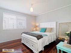  34 Centaur St Redcliffe QLD 4020 $499,000 Chic Cottage with a Touch of Hamptons Flair! This home must be seen to be believed. It has been fastidiously renovated with no expense spared. Walking through the french doors you will instantly feel at ease with the open plan living and dining leading into the custom designed kitchen. You will adore this kitchen and it is definitely the heart of this home and any aspiring chef will fall in love. The ample cupboard space and large Caesar stone bench tops compliment and further enhance the decadent, Hamptons inspired design. With an under mounted sink and Blanco appliances including built-in microwave, this kitchen has a seamless feel that will make cooking a pleasure. The stunning polished timber floors throughout give a feeling of continuity flowing from the front doors through to the back deck. The large master bedroom is complimented by the huge built-in wardrobe and enjoys a generous amount of natural light. With the well-proportioned second and third bedrooms opening onto the massive rear deck, outdoor entertaining is all sorted. The contemporary bathroom is finished with subtle tones and gorgeous fittings, making it a relaxing space that you won't want to leave. - 3 Bedrooms plus Study nook. - Fully renovated. - Polished timber floors throughout. - Reverse cycle air conditioning in the living area. - Large separate laundry. - Powder room separate to the bathroom. - Large powered shed. - Low maintenance, fully fenced yard. - Brick construction with vinyl clad front and sides. This is a home that is beyond compare. If you enjoy the finer things in life, this is the home for you. Call Andrew and Ben today for your inspection! 