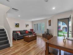  51/139 Pring Street Hendra QLD 4011 Luxury Townhouse at Tea Tree Grove Set at the end of one of Hendra's finest streets is the resort style complex of Tea Tree Grove. Adjacent to Healthworks Fitness Centre, so there is no excuse, we are delighted to present Unit 51. The double storey, 3 bedroom townhouse has been tastefully decorated and embellished to give you a true sense of home, yet with the accompanying low maintenance lifestyle. Positioned at the end of one of the various alley ways, the home is adjacent bushland creating a very private and peaceful space. On the lower level, atop stylish timber laminate flooring is a lounge and dining area, framed with superb white shutters. The adjacent kitchen with breakfast bar is large by townhouse standards, with quality appliances and oodles of bench and cupboard space. Adjacent, through sliding glass doors is the covered rear courtyard, fully paved and bordered by low maintenance gardens and plantings and very private. Here we also find a roller door giving access to the rear of the single garage. On the upper level are the bedrooms, recently recarpeted with the Master Suite at the front of the home with own balcony overlooking bushland, a large ensuite with shower, and a huge mirrored wardrobe. The plantation shutters are repeated here on doors and windows, in keeping with the style and theme of the home. There are 2 further bedrooms, one with two way access to the second bathroom with corner spa bath. The additional embellishments of this delightful townhouse include ducted airconditioning to both levels, drive through single car automated garaging, fully fenced and secure with side access to the rear courtyard, intercom to front gate and nearby a communal barbecue and outdoor dining space set around a village green. The complex is secure, well managed and beautifully maintained, with a delightful and pleasant entrance to the complex through remote controlled gates. Adjacent to Healthworks Fitness Centre, with tennis courts and swimming pool, Thai Inspired Spa and Gymnasium, this is truly a resort lifestyle home. Walking distance to bus and train, Doomben and Eagle Farm Racecourse and minutes to Racecourse Road with its plethora of retail and dining options. Brisbane CBD is just 8 kilometres, and Brisbane Airport a mere 6 kilometers away. Upper Level  1 Master bedroom with built-ins, ensuite & balcony  2 bedrooms, built-ins  Family bathroom Lower Level  Kitchen with dishwasher & gas cooktop  Living area  Dining area  Powder room  Laundry Ducted air conditioning  Intercom to front gate Undercover entertaining area  Singe car garaging  Space for a second car Close to public transport  Close to schools  Close to shops 