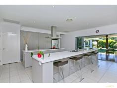  21 Ridge Pl Redland Bay QLD 4165 999,000+ Dual Living…Ultimate 2 Family Lifestyle!! On a private 1/2 acre in Redland Bay, Electric gates roll back to reveal this sprawling 55 + square residence offering a family friendly design with an emphasis on style and quality. An ideal home for one big family or two, this fantastic floor-plan provides options galore..  * 	 4 Living areas; Including 2 large & separate lounge areas, family rumpus & genuine media room.  * 	 6 Spacious bedrooms; Including 3 master suites, and 4 bathrooms.  * 	 2 Kitchens; Both boast luxury finish with stone bench-tops & stainless appliances.  * 	 Stunning resort style pool; Complete with party cabana.  * 	 Super large outdoor entertaining area, central to both dwellings.  * 	 Tropical low-maintenance grounds boasting large grassy areas ideal for a bit of backyard footy or cricket.  * 	 6 car garaging; Including 4 car house garaging, plus separate shed with 3 phase power!  * 	 Add to this 9ft ceilings, ducted air-conditioning, intercom & video security, solar electricity, water tanks, and fully fenced with electric entrance gate.  Custom built to the highest standard, this unique property is literally 'one of a kind' and offers something very special for buyers looking to purchase a Dual Living masterpiece. PROPERTY DETAILS 999,000+ ID: 328255 Land Area: 2000 m² 